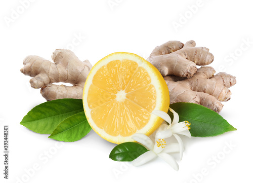 Fresh ginger root and lemon on white background photo