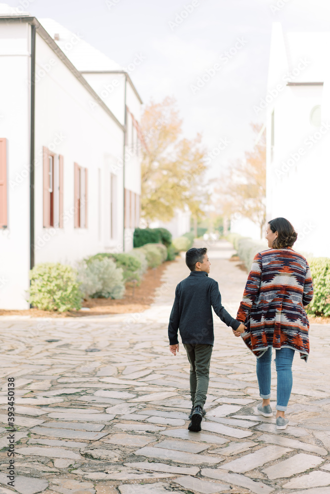 Mom walking with her son Mom walking with her son