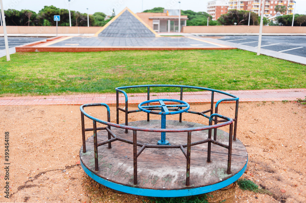 Isolated blue swing in children playground Isolated blue swing in children playground