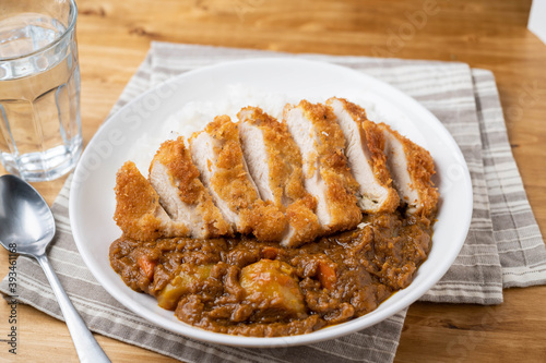 crispy chicken katsu curry on wooden board