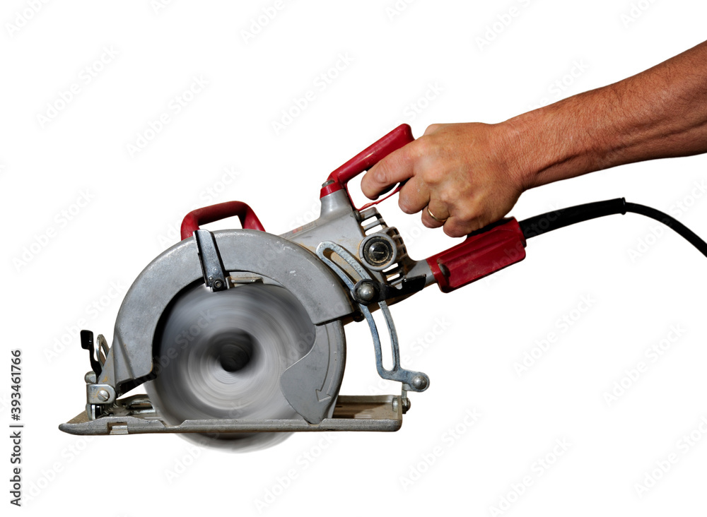 Power saw with blurred cutting blade isolated Power saw with blurred cutting blade isolated