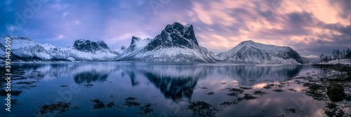 Mirror-like reflection of norwegian mountain range