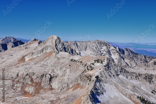 View of Pfeifferhorn peak and Lone Peak Wilderness mountain landscape from White Baldy and Pfeifferhorn trail, towards Salt Lake Valley, Wasatch Rocky mountain range, Utah, United States. 