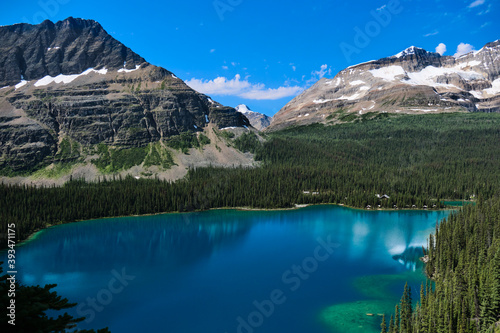 Mountain blue lake with clear water and reflections. Lake O'Hara in Yoho National Park. British Columbia. Canada 