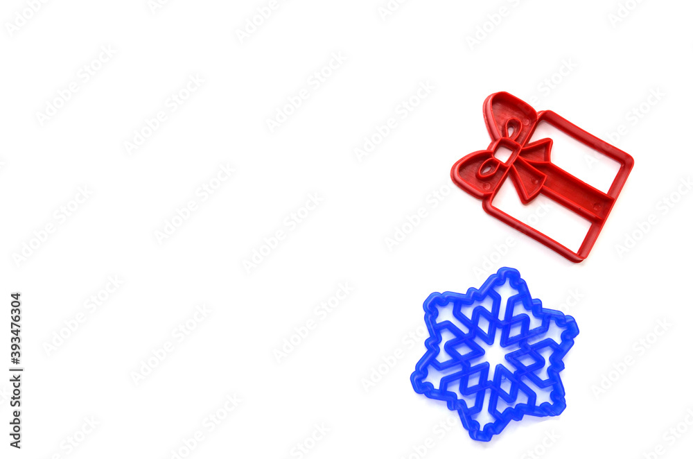 Christmas cookie molds in the shape of a gift box, snowflake, creative food concept
