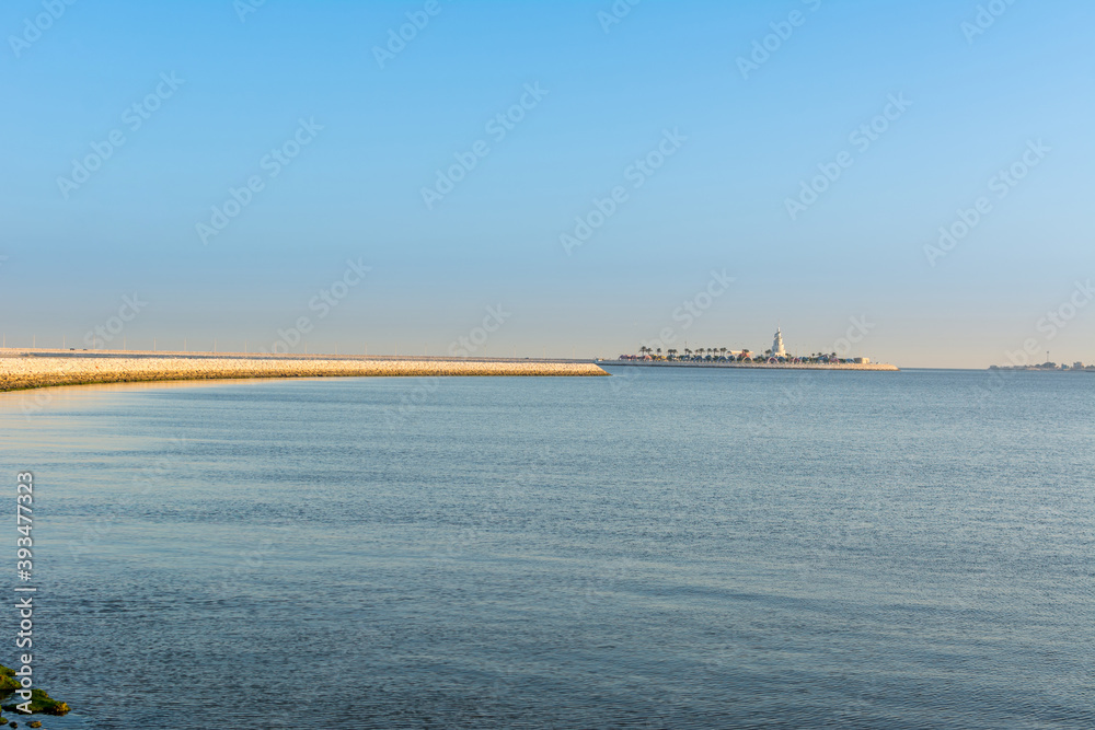 Blue sea and island with blue sky in the morning at the corniche park in Dammam, Kingdom of Saudi Arabia