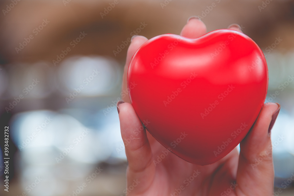 Woman hold red heart Woman hold red heart