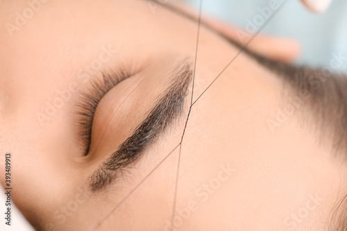 Young man undergoing eyebro...