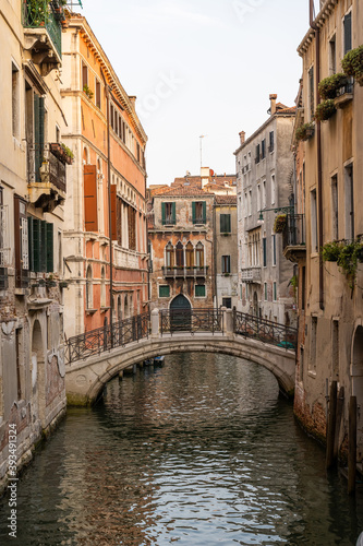One of the countless beautiful small canals in the old town of Venice, Italy