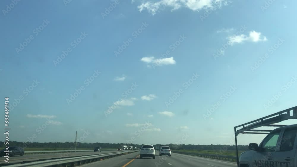 Driving into Interstate 75 from Atlanta, Georgia to Miami, Florida USA crossing both states in a afternoon day. Driving into Interstate 75 from Atlanta, Georgia to Miami, Florida USA crossing both states in a afternoon day.