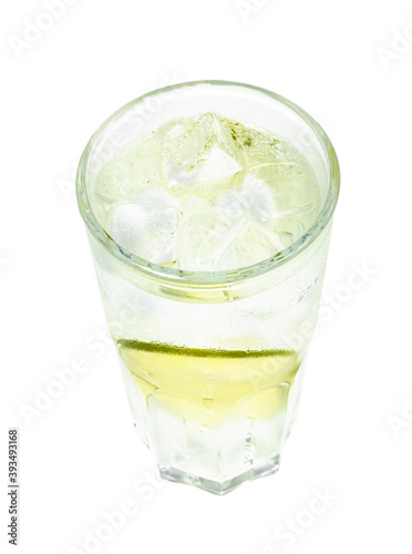 above view of gin and tonic cocktail in highball glass with slices of lime and cubes of ice isolated on white background