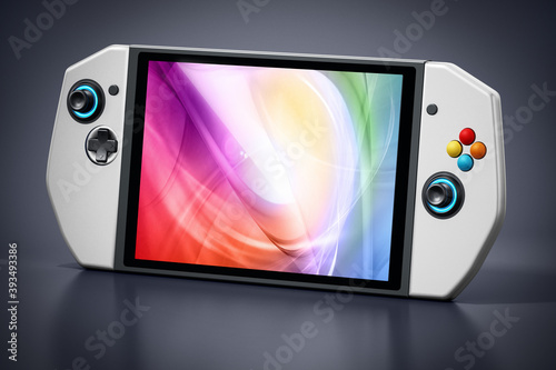 Obraz na plátne Portable video game console isolated on black background