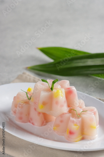 Cantik Manis. Indonesian traditional steamed dessert made from mung bean flour, sago pearls and coconut milk.