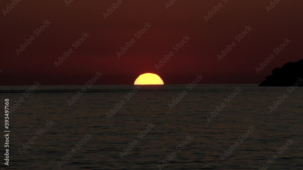 closed frame of how the sun goes down by the sea of Ibiza, Spain. 4K. Pro Res closed frame of how the sun goes down by the sea of Ibiza, Spain. 4K. Pro Res