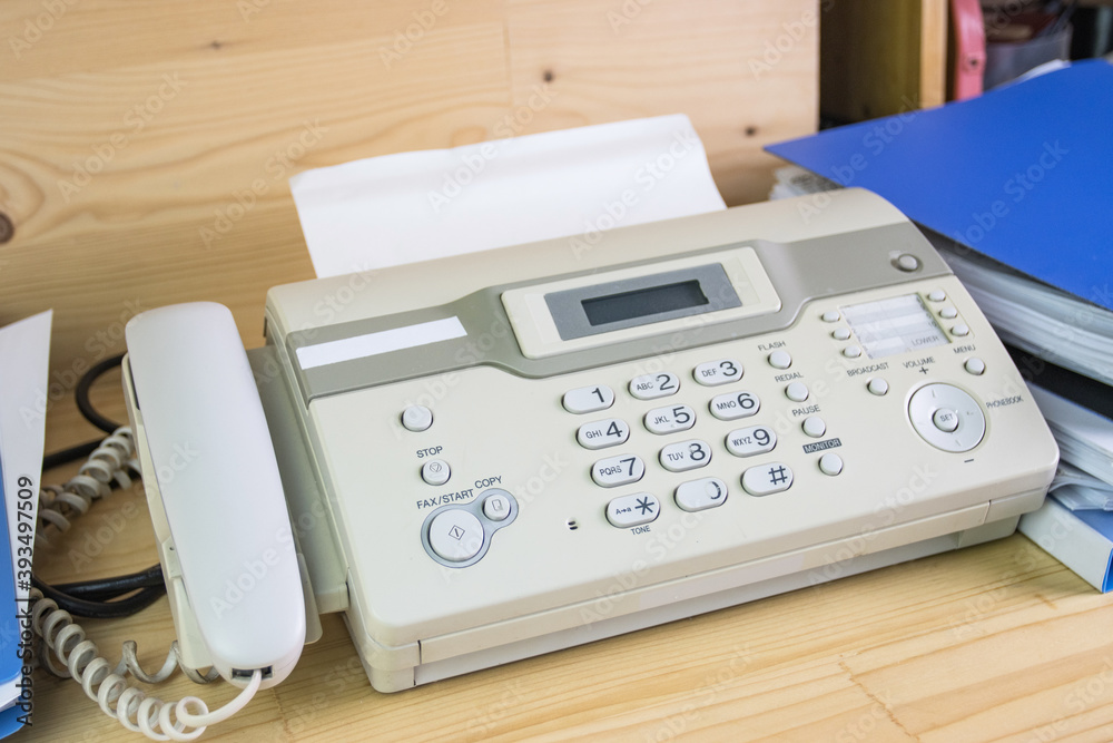 The fax machine use for Sending documents in the office, concept equipment needed in office The fax machine use for Sending documents in the office, concept equipment needed in office