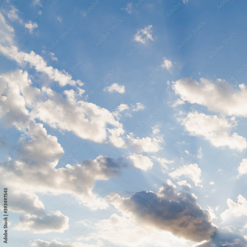 Fototapeta premium Blue sky with Cumulus clouds on a Sunny day. Beautiful background.