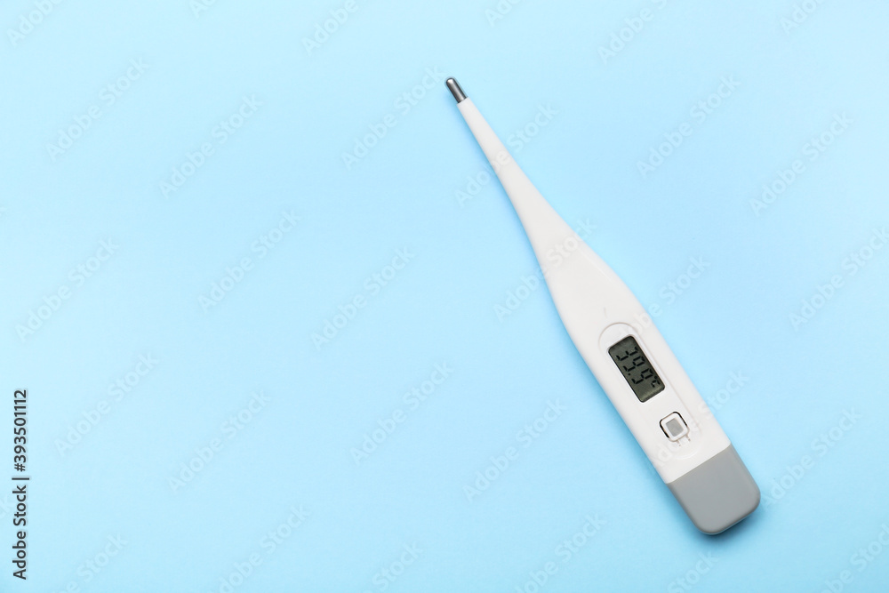 Electronic thermometer on color background Electronic thermometer on color background