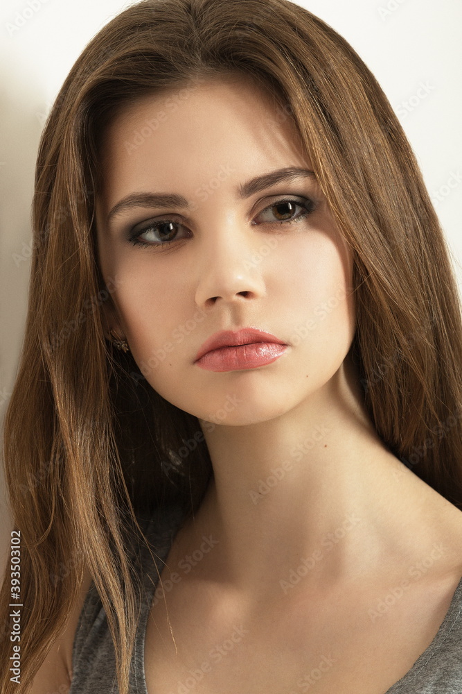 Obraz premium Beauty face makeup. Make up. Perfect Make-up closeup. Foundation. Cosmetic Eyeshadow, eyebrow. Beauty Girl with Perfect Skin. Makeover