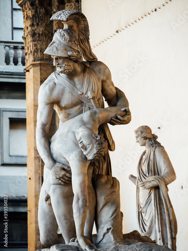 Menelaus supporting the body of Patroclus, in the Loggia dei Lanzi, Florence, Italy. Renaissance marble statue sculptures that copy a Hellenistic bronze original, dating to ca. 200 150 BCE