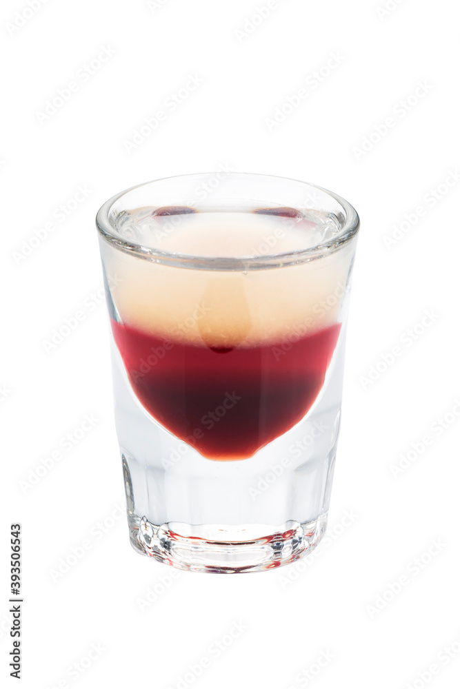 Alcohol shots cocktail in a glass isolated on white background. Layered composed of white and red liqueur Alcohol shots cocktail in a glass isolated on white background. Layered composed of white and red liqueur