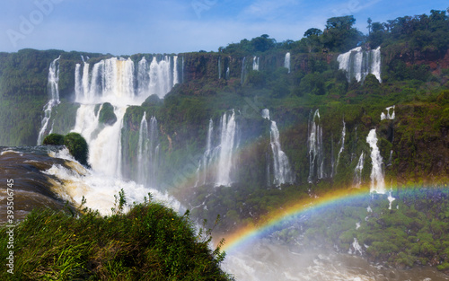 Rainbow over streams of waterfall Cataratas del Iguazu in Iguazu National Park  Brazil