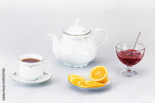 Cuadro en lienzo A beautiful tea-party with raspberry jam and fragrant lemon