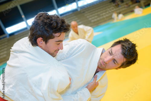 portrait of men in judo hold © auremar