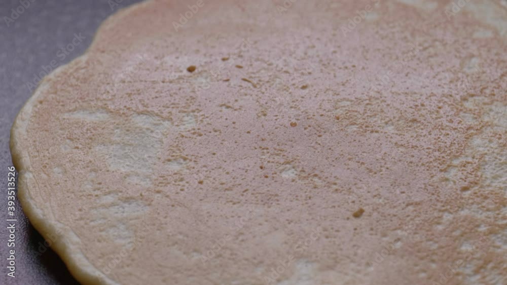 Extreme close-up of a pancake flip. Extreme close-up of a pancake flip.