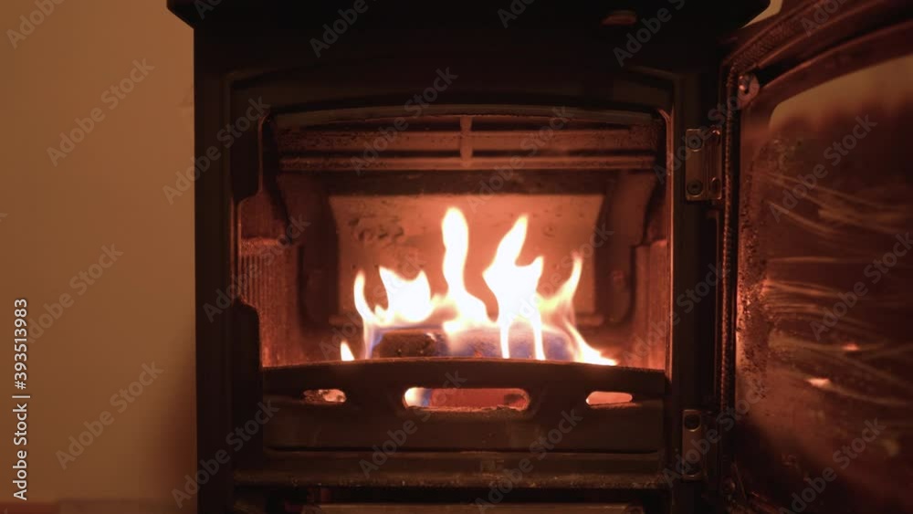 blazing fire in wood-burning stove in Ireland blazing fire in wood-burning stove in Ireland