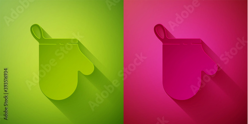 Paper cut Oven glove icon isolated on green and pink background. Kitchen potholder sign. Cooking glove. Paper art style. Vector Illustration.