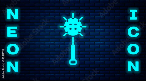 Glowing neon Medieval chained mace ball icon isolated on brick wall background. Medieval weapon. Vector.