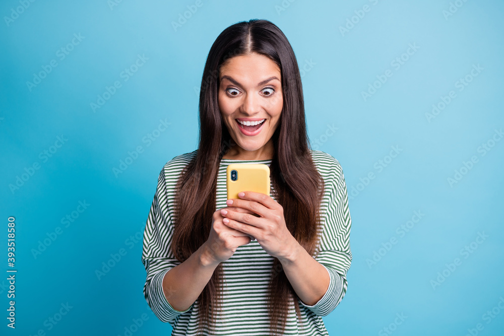 Portrait of attractive excited person staring open mouth unexpected follow isolated on blue color background Portrait of attractive excited person staring open mouth unexpected follow isolated on blue color background