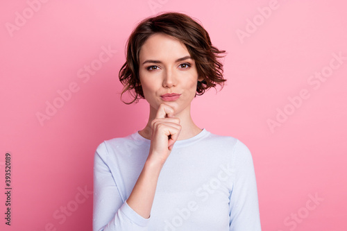 Portrait of interested girl touch hands chin think wear pullover isolated over pastel color background