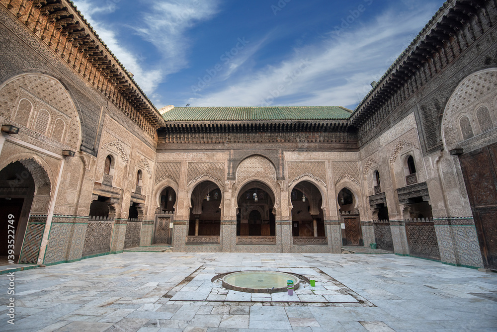 The Madrasa Bou Inania (Medersa el Bouanania) in FEZ, MOROCCO is acknowledged as an excellent example of Marinid architecture. Souk Medina of Fes el Bali