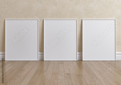 Triple 8x10 Vertical White Frame mockup on wooden floor and beige wall. 3D Rendering