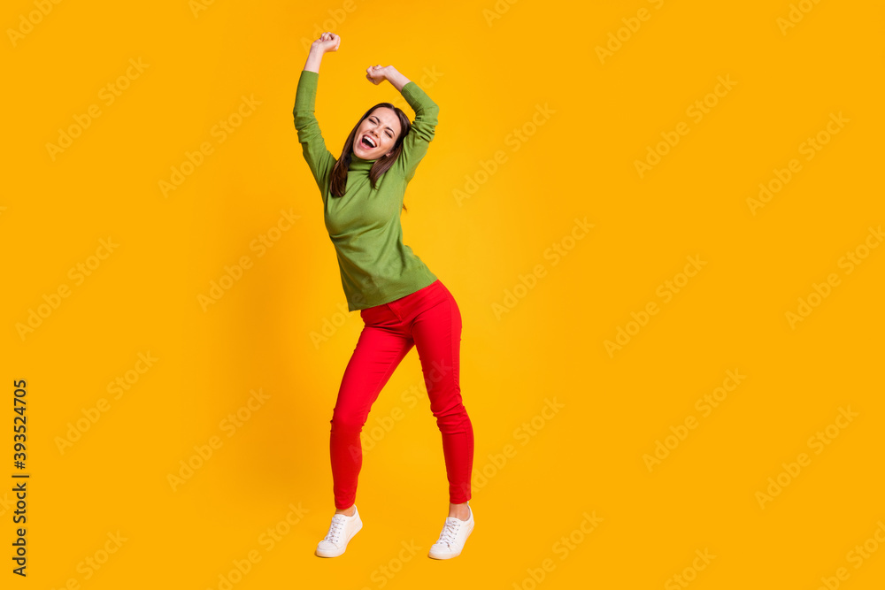 Full length body size view of attractive ecstatic funky cheery girl dancing having fun nightclub isolated bright yellow color background