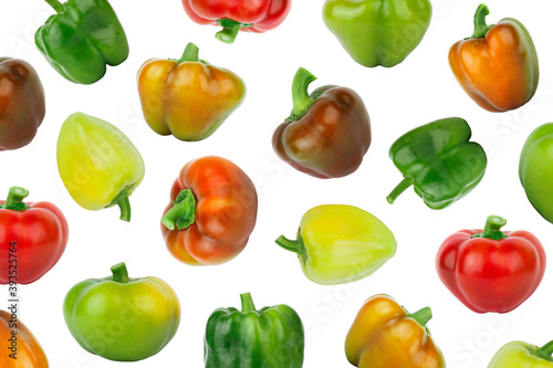 Background from colored raw bell peppers, isolated