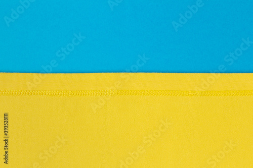 Yellow cotton fabric on blue background