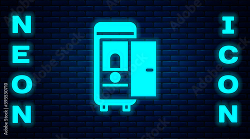 Glowing neon Toilet in the train car icon isolated on brick wall background. Vector.
