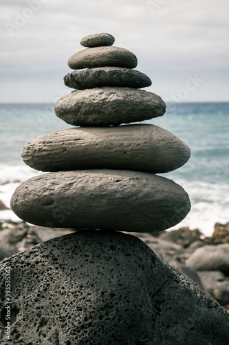 stack of stones on sea coast - Cairn