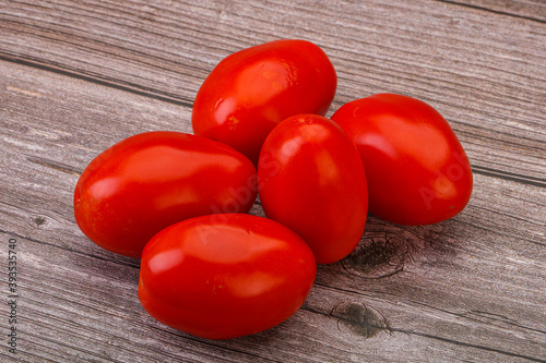 Red bright tasty tomato heap