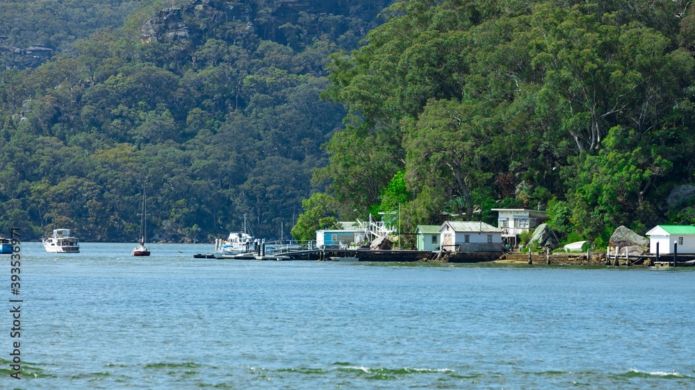 Boat Sheds amongst the trees on Hawkesbury River on Sydney Central Coast NSW Australia Boat Sheds amongst the trees on Hawkesbury River on Sydney Central Coast NSW Australia