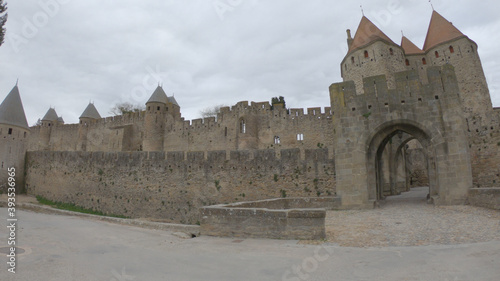 Fortifications of the medieval city of Carcassonne, France. The Narbonnaise gate, was built around 1280 during the reign of Philip III the Bold and was made up of two enormous spur towers. photo