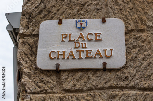 Fototapeta Naklejka Na Ścianę i Meble -  Carcassonne / France - March 15, 2020: Carcassonne Cité street sign Place du Chateau Square.