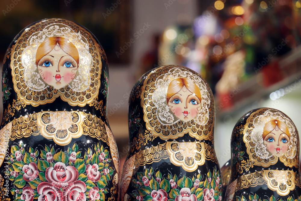 Russian nesting dolls in the souvenir shop window. Traditional wooden matryoshka dolls