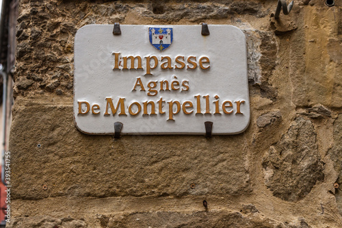 Carcassonne / France - March 15, 2020: Carcassonne Cité street sign Impasse Agnes de Montpellier Street.