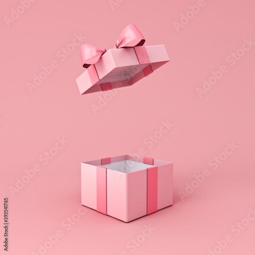 Fototapeta Naklejka Na Ścianę i Meble -  Blank open pink gift box or present box with pink ribbon bow isolated on light pink orange pastel color background with shadow minimal conceptual 3D rendering