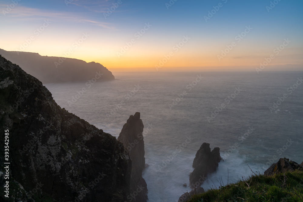sunset on the wild rocky coast of galicia in northern Spain
