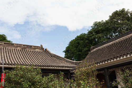 Chinese ancient buildings and house under the blue sky. © Holmessu