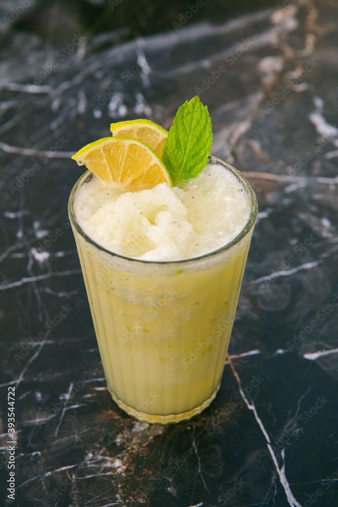 Glass of lemonade. Summer refreshing drink with lemon and mint. Glass of lemonade. Summer refreshing drink with lemon and mint.